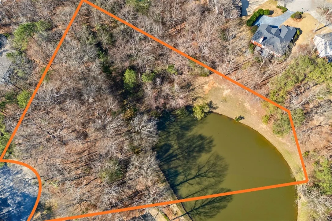 roughly half of pond and grass surround is on the lot
