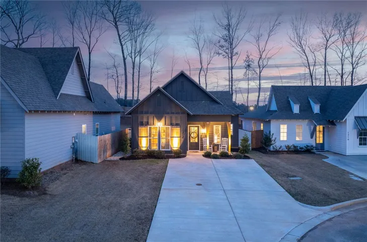 Home features professionally installed landscape lighting