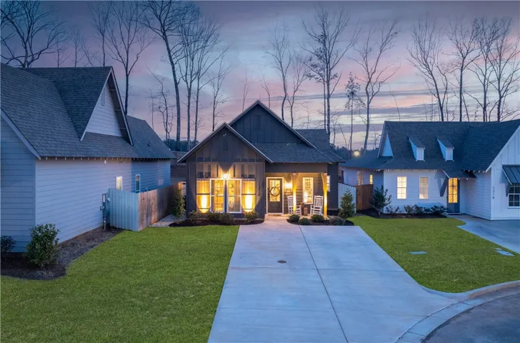 Welcome to 1210 Woodland Circle. Grass in image has been virtually edited.