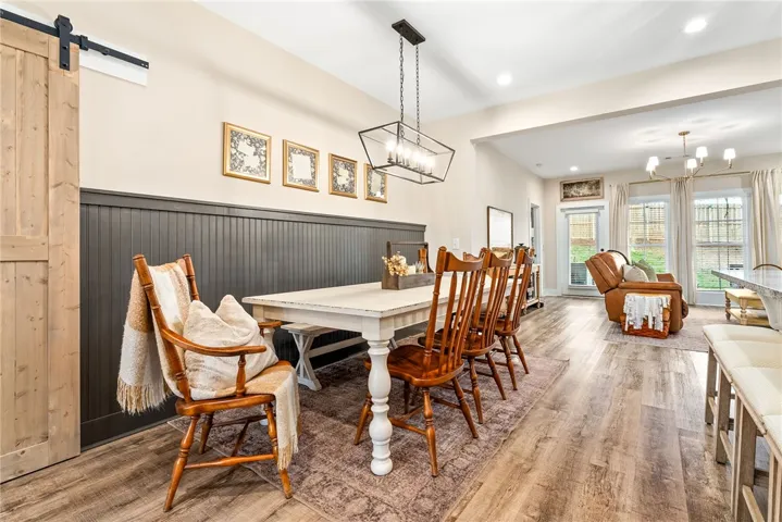 Dining room up accent wall and upgraded lighting