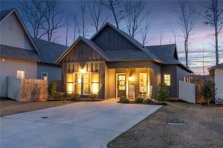 Home features professionally installed landscape lighting