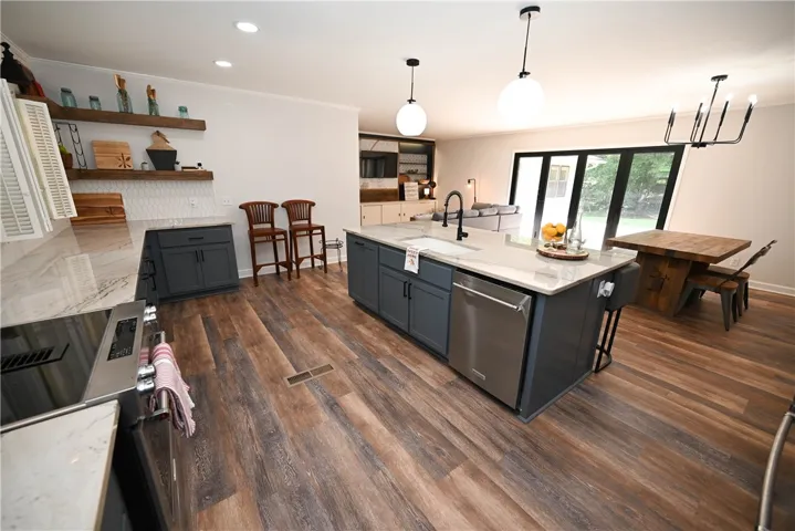 Stainless steel appliances and custom cabinetry.