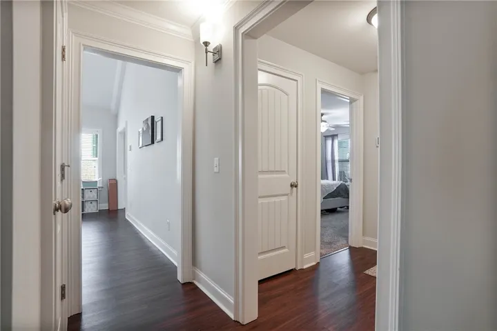 Hallway to bedrooms, laundry, and garage