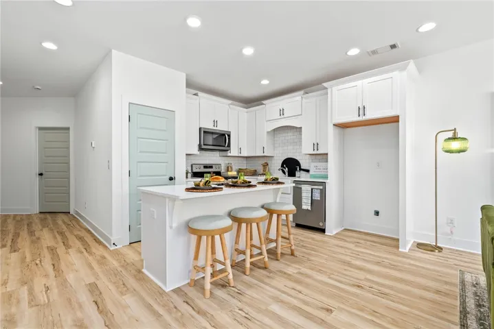 Large center island offers bar seating