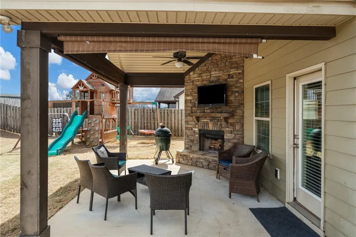 Fabulous backyard with a covered gameday porch