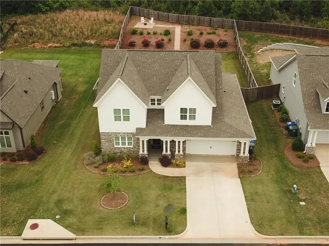 This inviting home offers a comfortable lifestyle with charming curb appeal and a well-maintained exterior.