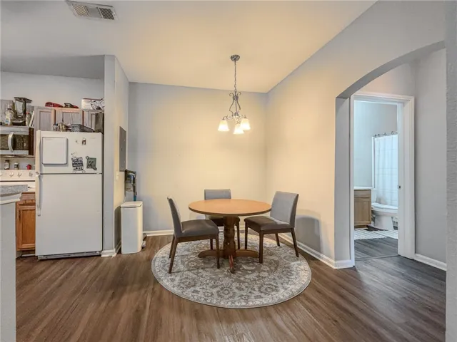 Kitchen leads to dining area.