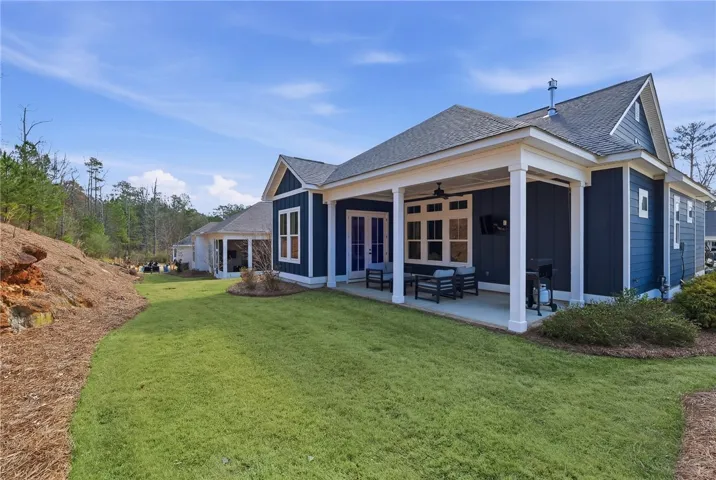 Exterior Rear Covered Porch and Lawn