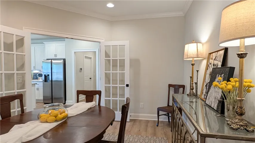 Dining/flex room just off of kitchen.