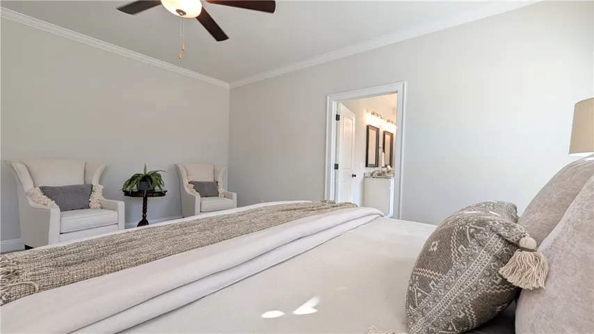 Tranquil and private primary suite. Other bedrooms are on the opposite side of the home.