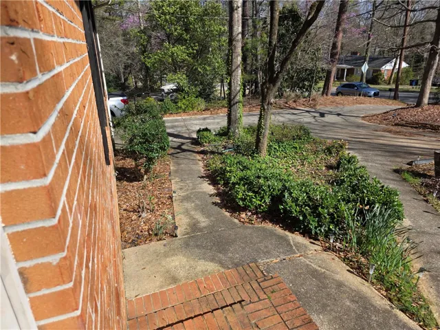 View from the front door towards the driveway and street