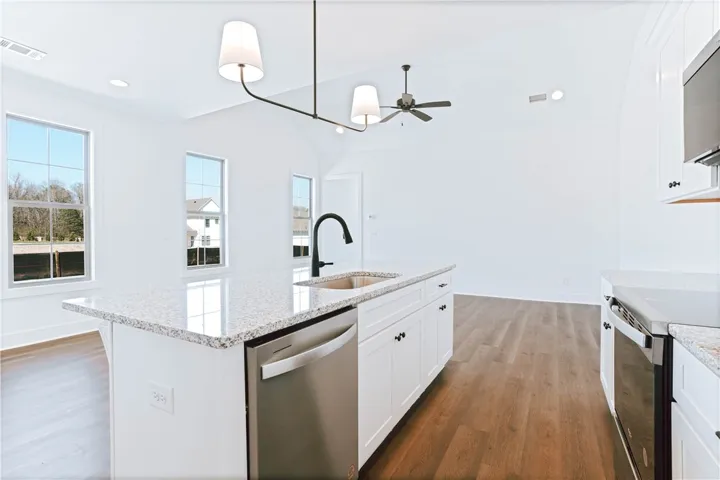 Whirlpool Appliances & Granite Countertops - Example of a completed Exterior Unit Townhome