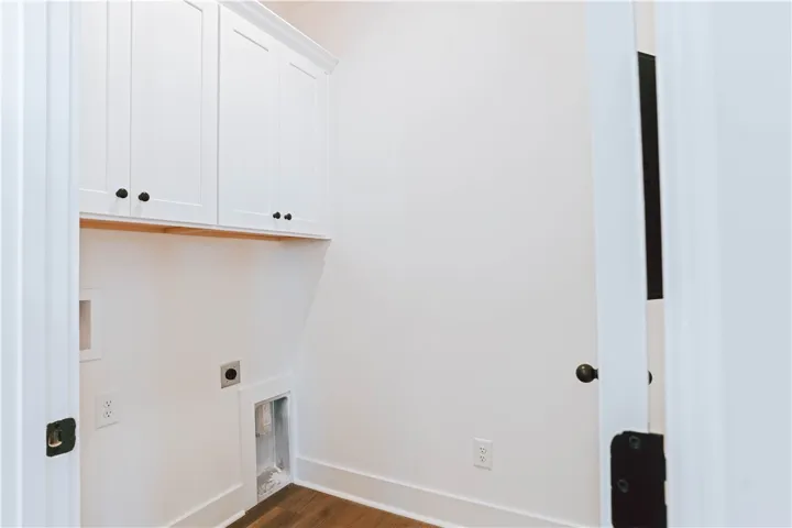 Laundry Room with Cabinet Storage - Example of a completed Exterior Unit Townhome