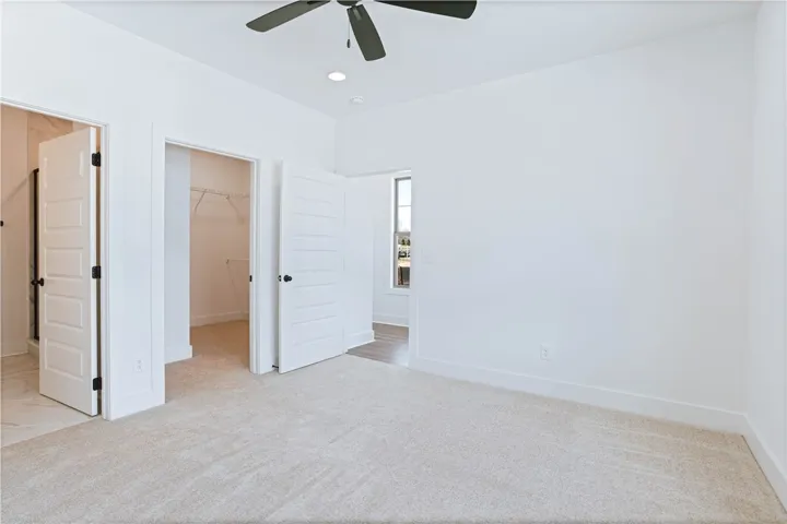Primary Bedroom features a walk-in closet and En-Suite - Example of a completed Exterior Unit Townhome