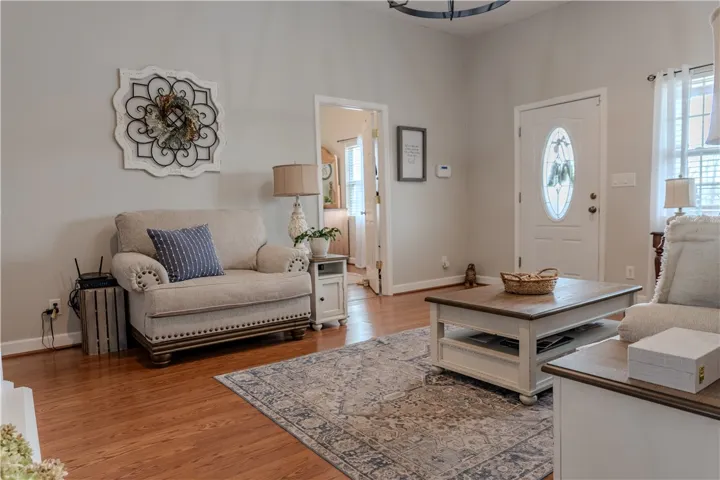 Living room area leading into Master bedroom with en-suite bath.
