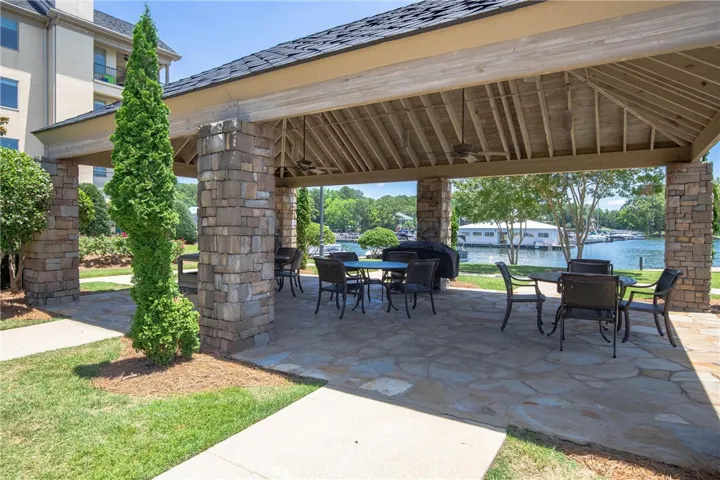 covered grill area near pool