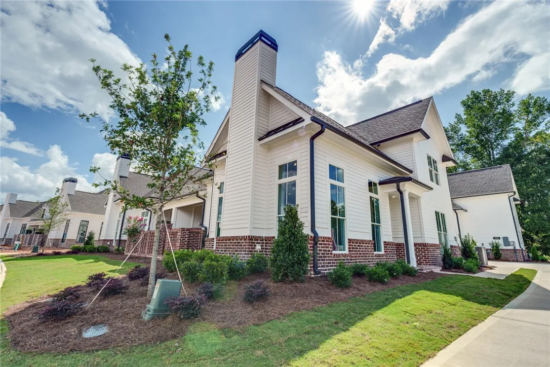 This charming residence features classic design with modern details and expansive windows.