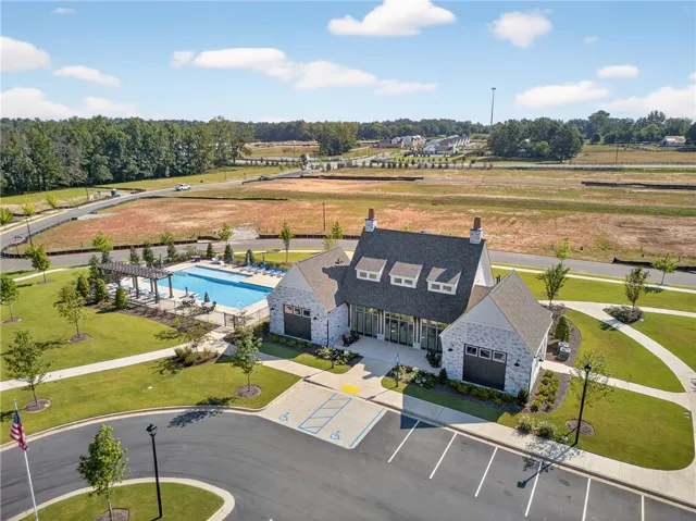 This aerial view showcases a vibrant community pool area, perfect for leisure and recreation.