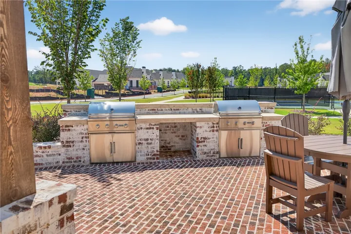 This patio features a built-in barbecue area, perfect for entertaining outdoors.