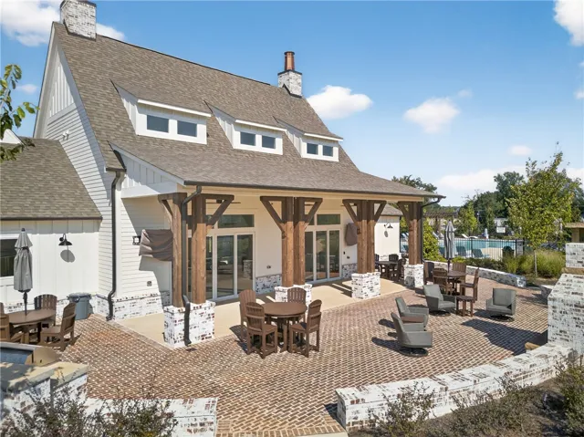 This spacious outdoor patio area offers ample room for entertaining guests or enjoying peaceful relaxation.