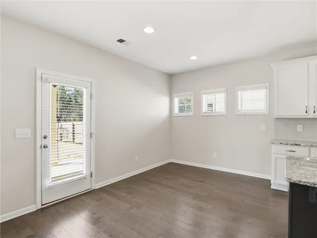 Breakfast room area that opens to the pool and covered patio