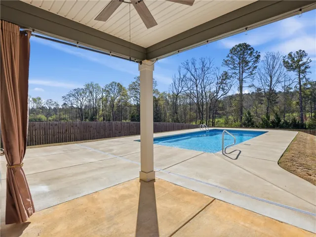 Covered patio overlooking the pool