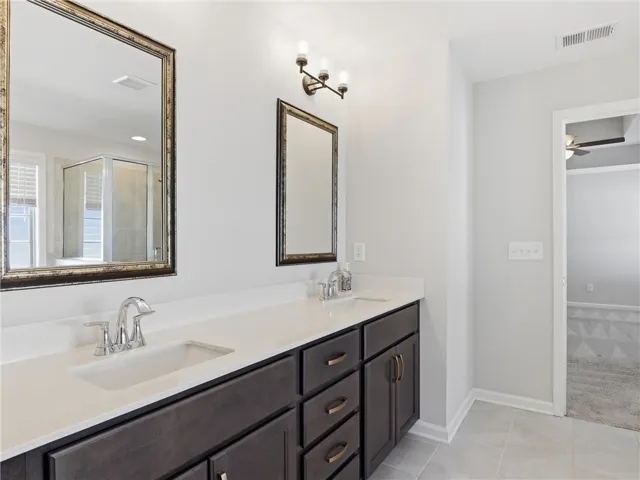 primary suite bathroom vanities