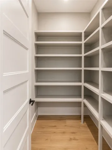Ample built-in shelving provides abundant storage for a well-organized home.