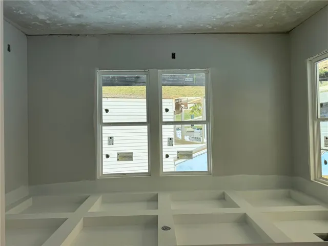 Study with coffered ceiling and french doors
