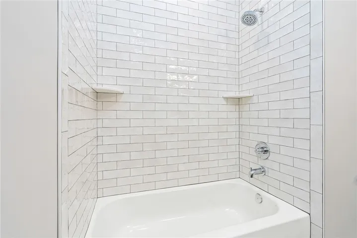 This sleek bathroom features clean lines and modern finishes for a refreshing experience.