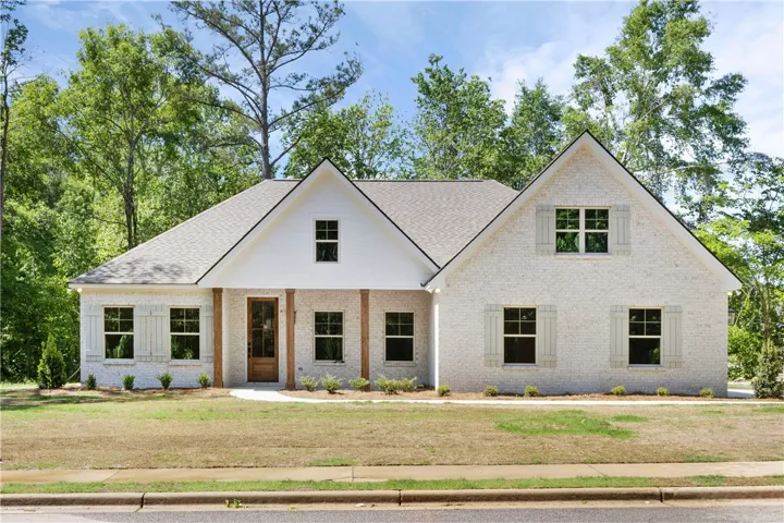 This charming home offers classic architectural details and a welcoming facade.