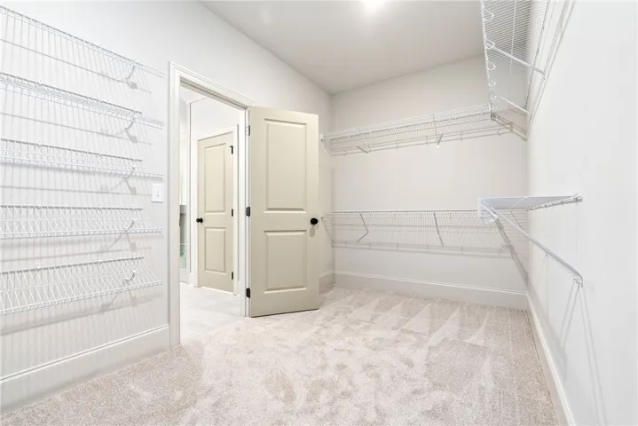 This spacious closet offers ample storage and organization for all your essentials.