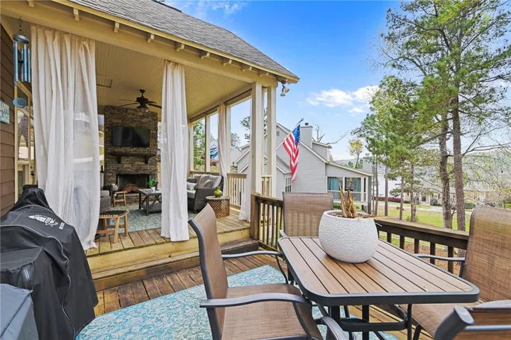An inviting outdoor patio offers relaxation and entertainment opportunities with a covered sitting area.