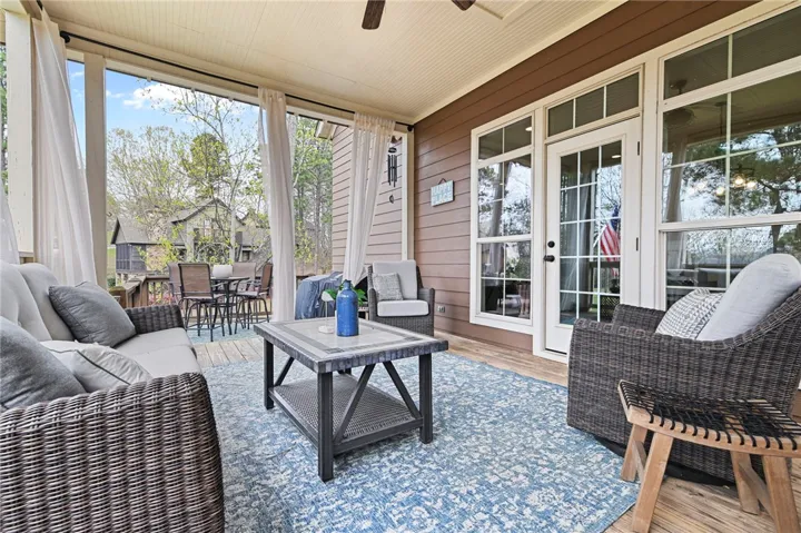 Relax and unwind in this inviting outdoor retreat, offering ample space for entertaining amidst serene surroundings.