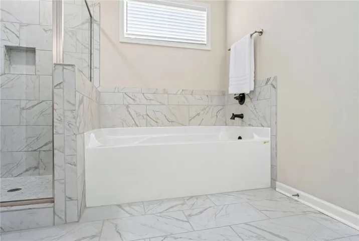 Extra Long Soaking Tub in Primary Bathroom
