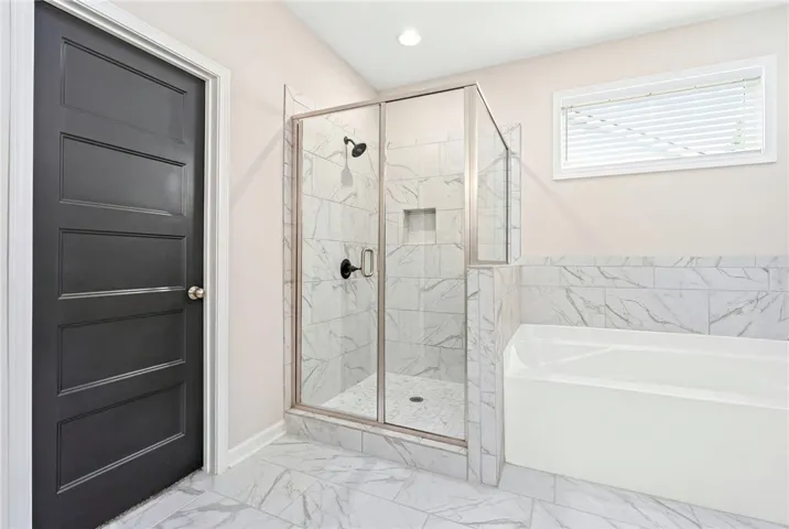 Tiled Shower in Primary Bathroom