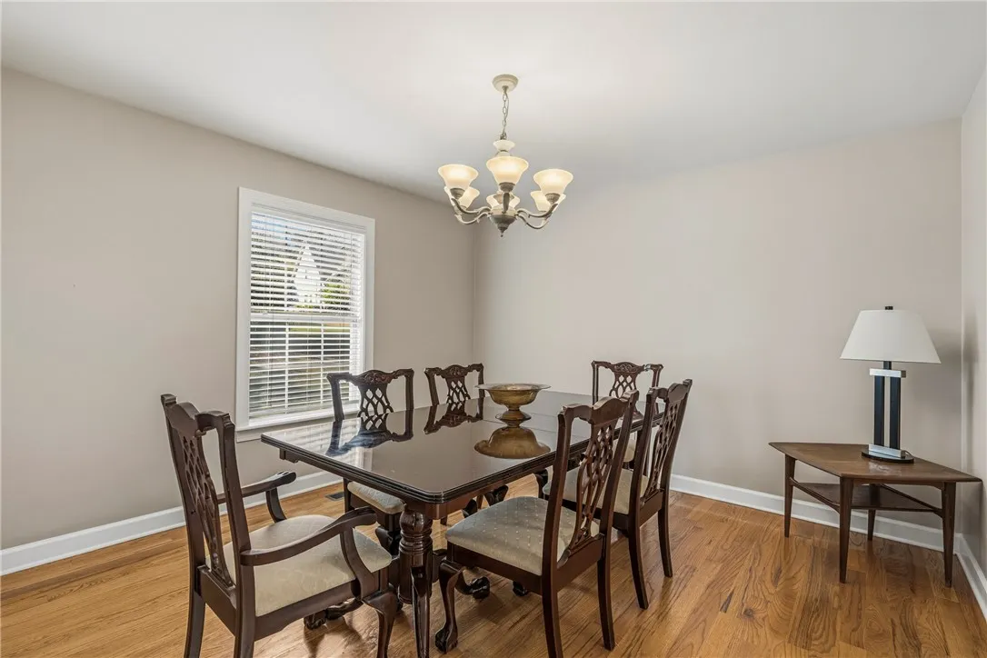 Dining room with a butlers passing door into the kitchen