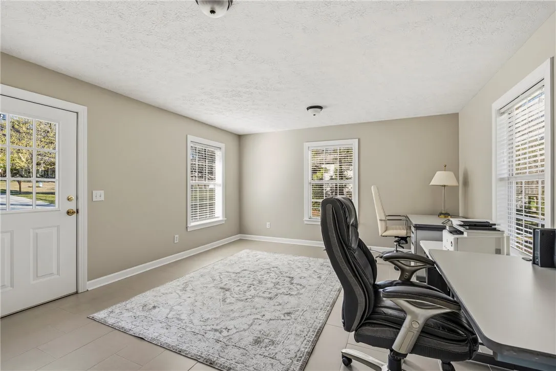 The office is wonderful for a home business as it has exterior access off the driveway.