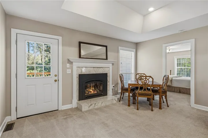 Marble surround on the gas fireplace was installed by Top Hat Chimney