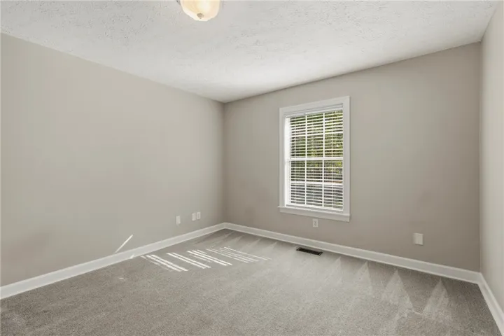 Bedroom 3 shares a hall bath with bedroom 4.