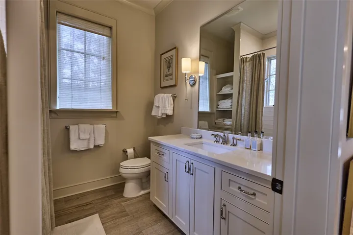 Each guest bath has heated floors