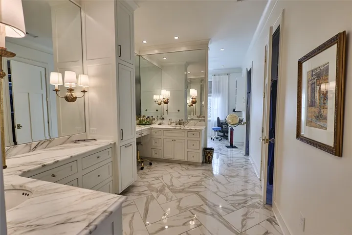 Marble countertops, heated floors, additional room for office and workout space