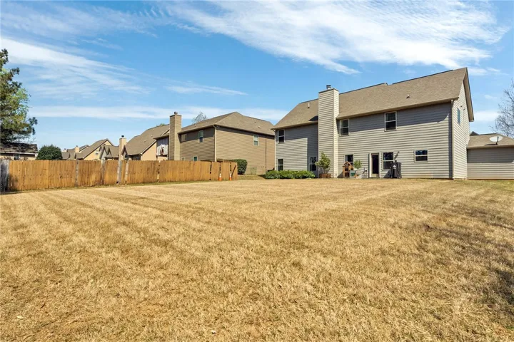 This home backs up to a wooded area.