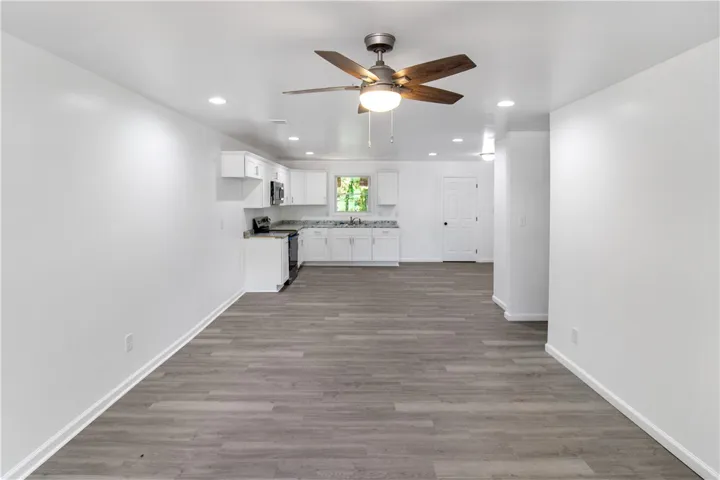 This bright and airy space features an open concept kitchen, perfect for everyday living.