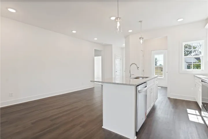 Example of a completed Todd Plan - Granite Countertops & LVP throughout all common areas