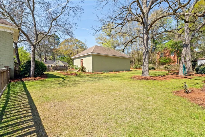 Rear fenced yard.