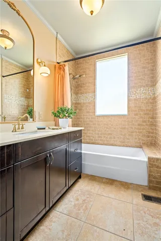 Primary bath with lovely tile updates.