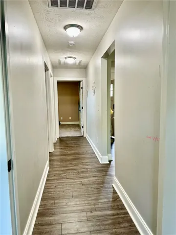 Hall to bath and 3 bedrooms