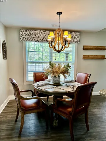 This inviting breakfast area has an  abundance of natural light.