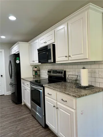 durable countertops, and sleek stainless steel appliances.